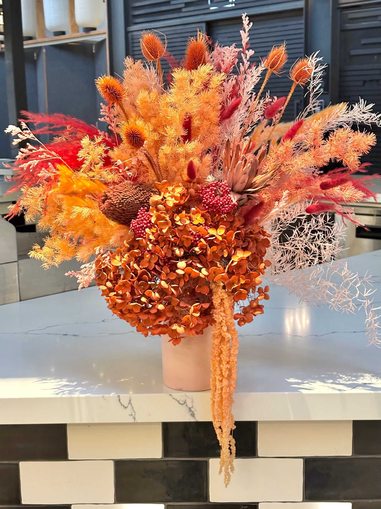 Orange dried flower arrangement