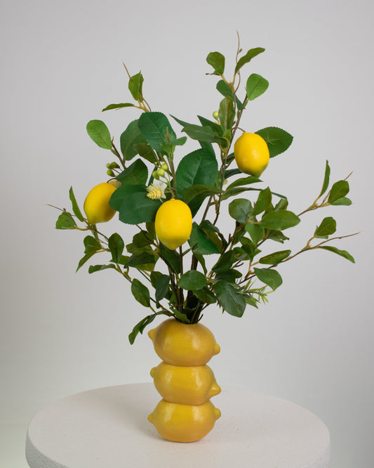 Realistic artificial lemons, leaves, and blossoms