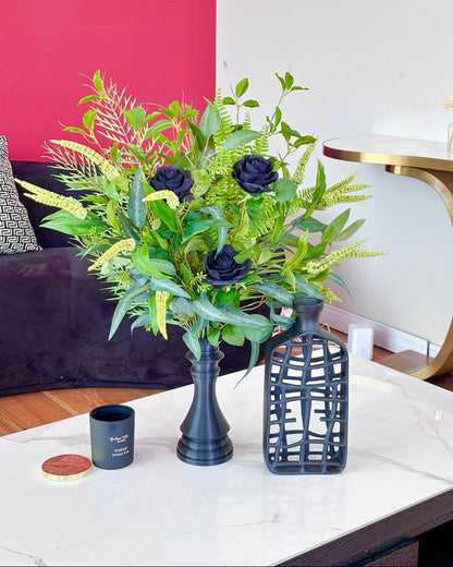 artificial centerpiece arrangementt with black roses in modern vase